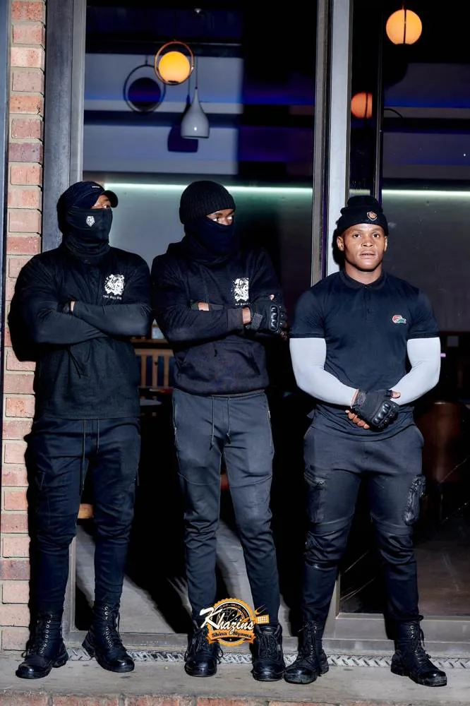 Bull Dogs officers on duty at a lounge entrance