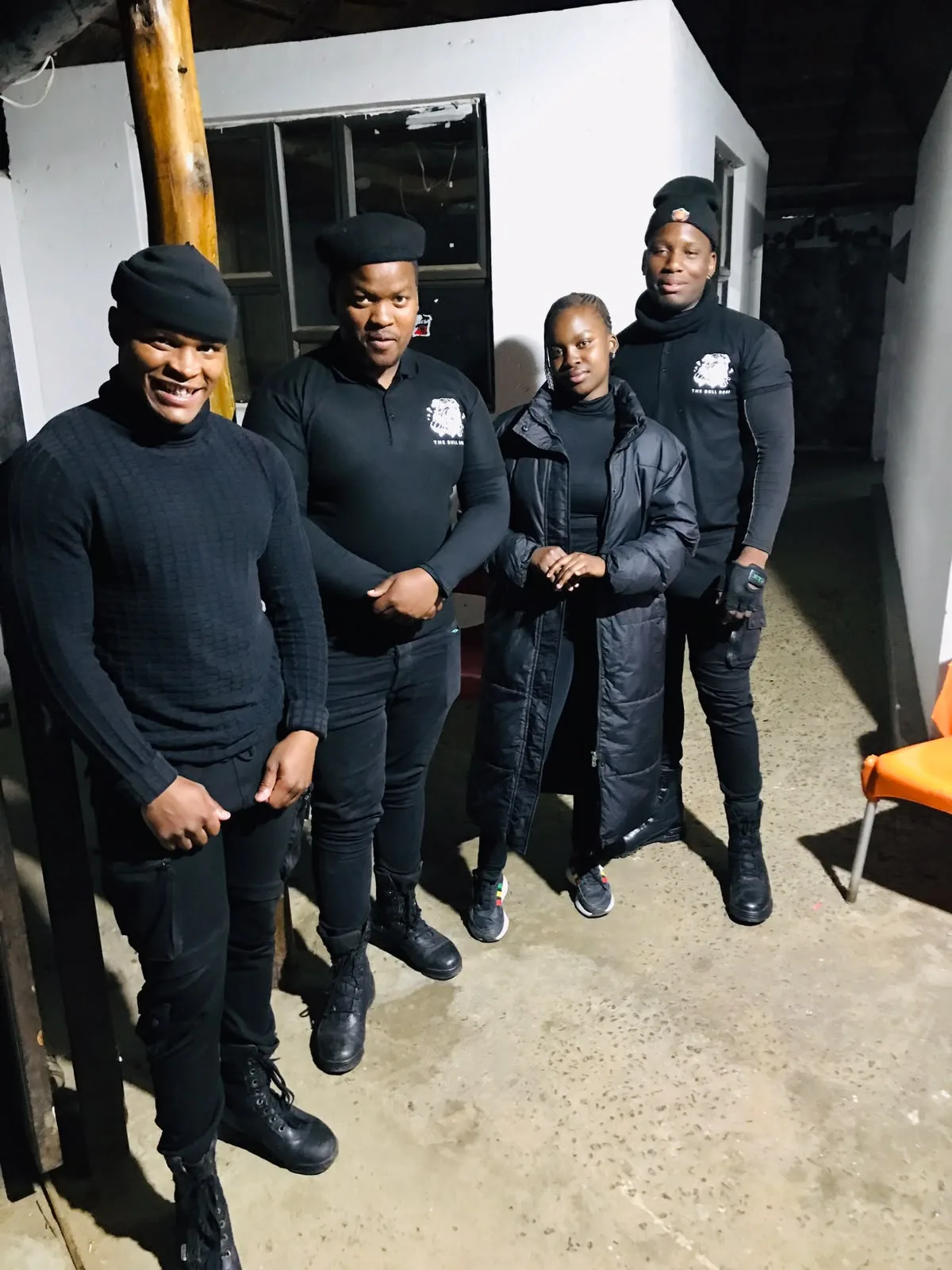 Four Bull Dogs team members in uniform on duty